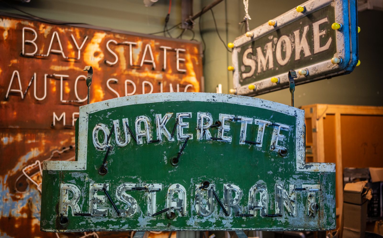Shelves of restored vintage neon signs